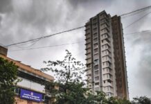 여름 자연재난 인명피해 최소화…태풍·호우 대비 실태점검 man in gray jacket and gray pants standing beside black car during daytime