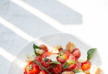 운동과 영양의 조화: 건강한 삶을 위한 필수 공식 sliced tomato and green leaf vegetable on white ceramic plate