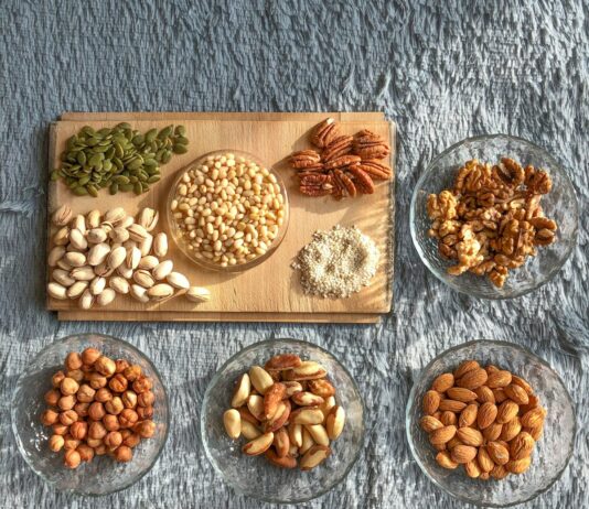 남성 건강을 위한 필수 영양소 brown and white nuts on white ceramic bowls