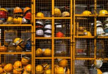 어린이 안전사고 지난해 3.4% ↑…안전주의보 발령 a rack filled with lots of yellow hard hats