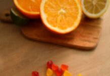 추운 날씨 속 몸과 마음의 안정 찾기 a bottle of gummy vitamins sitting on top of a wooden table