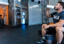 운동 후 단백질 섭취의 중요성과 올바른 식단 구성 person in black and white nike sneakers sitting on black leather couch