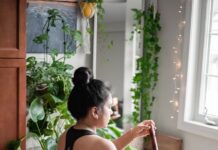 스트레스 해소를 위한 명상 가이드 a woman sitting on a pink mat