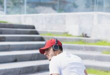 운동으로 예방하는 관절 질환: 근육 강화로 관절을 보호하기 man in white t-shirt and black and white pants wearing white sneakers sitting on concrete