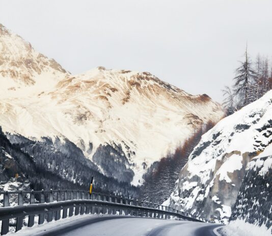 빙판길 부상 예방과 대처방법 black car on road near snow covered mountain during daytime