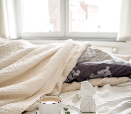 나의 아침을 깨워주는 스트레칭 teacup filled with liquid placed on saucer