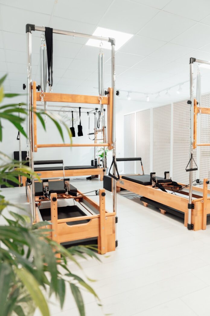 a room filled with lots of machines and a plant