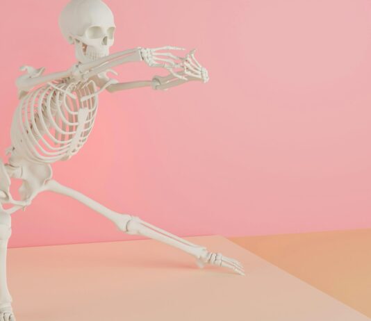 “앉아 있을 땐 괜찮은데 걸으면 허리가 아파요”… 걷기 유발 요통, 고관절의 경고입니다 a skeleton is dancing on a pink background