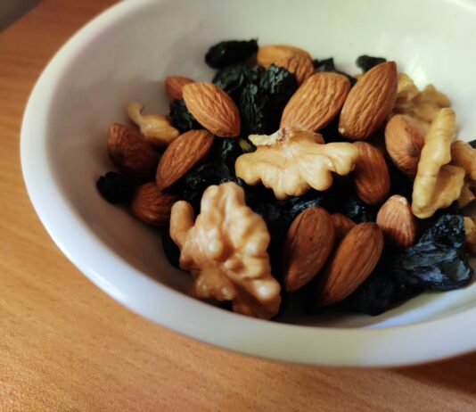 뇌건강 지키는 생활습관, 지금부터 실천하세요 brown and black nuts on white ceramic bowl