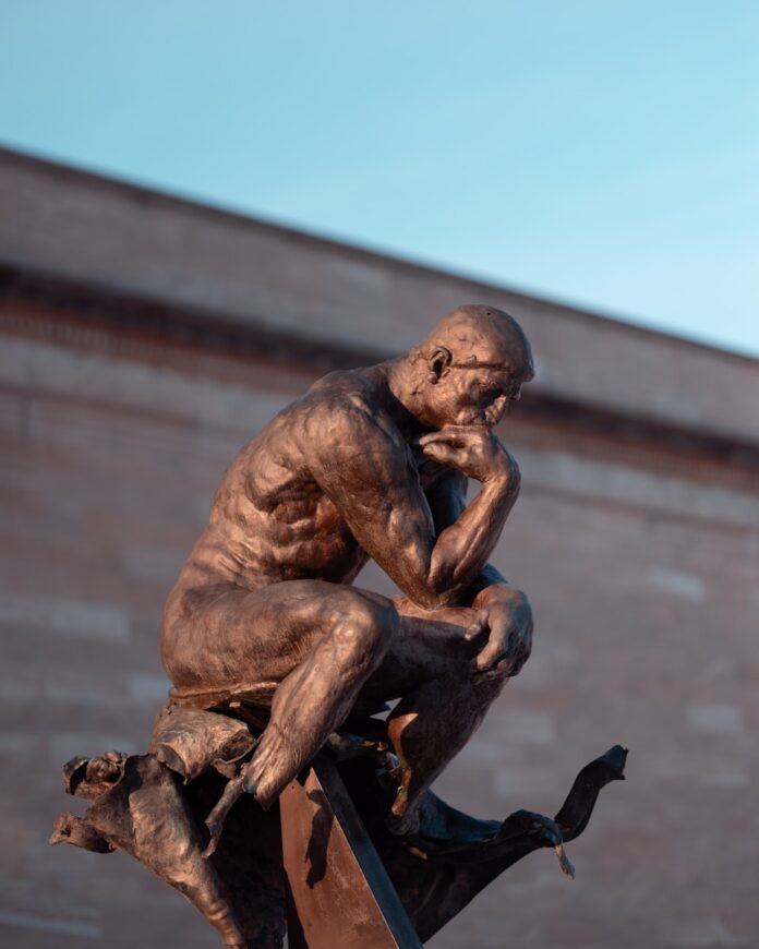 Photo by benjamin lehman The thinker sculpture poses thoughtfully.