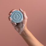 아름다운 머릿결, 일상 속 작은 변화로 지키세요 a person holding a soap bar in their hand