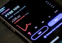 일상에 스며든 AI 건강 관리…’나만의 건강 코치’ 시대 열리다 black smartphone on brown wooden table