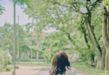 일상 속에서 지키는 정신건강, 작은 실천이 만드는 큰 변화 woman in white dress walking on road during daytime