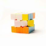 “뇌 건강 지키기, 일상 속 작은 변화에서 시작하세요” a stack of colorful blocks sitting on top of each other