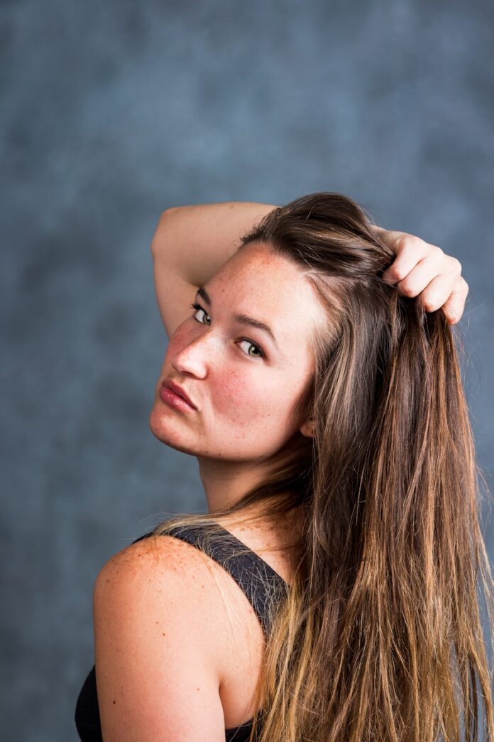 Photo by Dean Tyler woman in black tank top