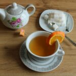 바쁜 일상 속에서 주목받는 대체요법, 건강을 지키는 새로운 일상 루틴 a teapot and tea cup on a table