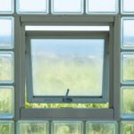 아침 루틴의 힘, 바쁜 일상 속 건강 지키기 Open window in glass block wall overlooking landscape