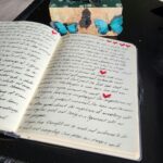 바쁜 일상 속 스트레스, 일상 속 작은 변화로 가볍게 다스리기 An open book sitting on top of a table