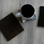 ‘작은 변화, 큰 차이’…일상 속에서 실천하는 정신건강 관리법 mug, wallet, and smartphone