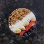 “뇌건강이 곧 내일의 활력”… 일상의 작은 습관으로 두뇌를 지키는 법 white rice with sliced strawberries and brown nuts on white ceramic plate