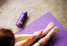 필라테스, 건강과 마음을 모두 챙기는 생활 습관으로 자리잡다 woman in yellow pants lying on purple textile