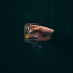 “늘 피곤하다면? 만성피로 해소 위한 실생활 건강 루틴 주목” person holding clear drinking glass with water