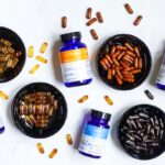 “영양과 보충제, 우리 생활에 어떻게 녹일까” blue and white plastic bottle beside brown round ashtray