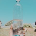 “건강한 식단, 최근 트렌드 따라 나만의 루틴 만들기” person holding clear plastic bottle