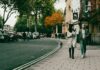 최근 수면 트렌드, ‘도심 속 숙면 루틴’이 열풍…작은 습관이 만드는 큰 변화 a couple of people walking down a street