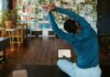 미니멀 홈트 열풍, 일상 속 ‘작은 운동’ 실천법 주목 a man doing yoga in a living room