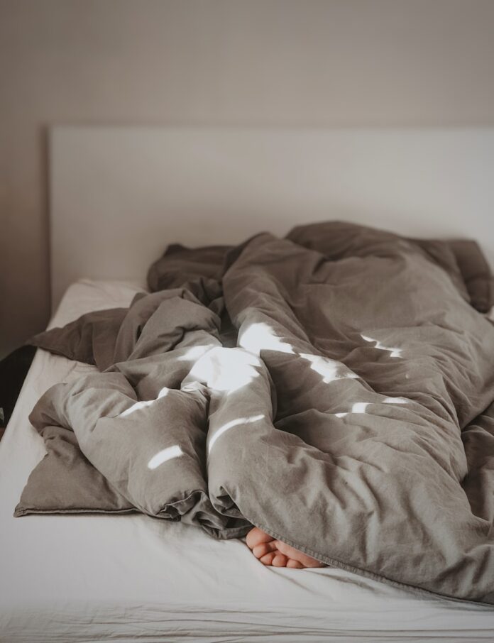 Photo by Rehina Sultanova brown and white bed linen