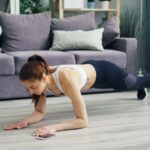 일상을 지키는 힘, 스트레스 관리의 새로운 바람 a woman is doing push ups on the floor