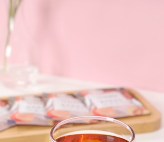 작지만 확실한 변화, 한국에 스며든 ‘웰니스’ 문화…일상 속 실천법 제안 clear drinking glass with orange liquid