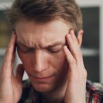 만성피로 증후군, 원인과 극복 방법을 알아보다 a man holding his hands to his ears