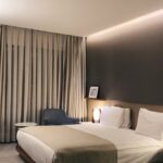 “깊은 잠이 일상 활력의 열쇠…일상에서 실천하는 수면 건강 트렌드” white bed with gray pillow