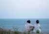 정신건강, 일상 속 작은 변화를 통한 회복의 시작 two people sitting on a rock looking out at the ocean