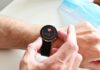 웨어러블 데이터, 건강 관리의 든든한 동반자 A person checking a heart rate monitor on a smartwatch on their wrist