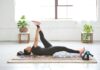 웰니스 회복, 현대인의 필수 건강 전략으로 떠오르다 woman in black tank top and black leggings lying on black and white floral area rug