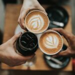 커피 한 잔의 힘, 건강하게 즐기는 스마트 커피 생활법 three person holding beverage cups